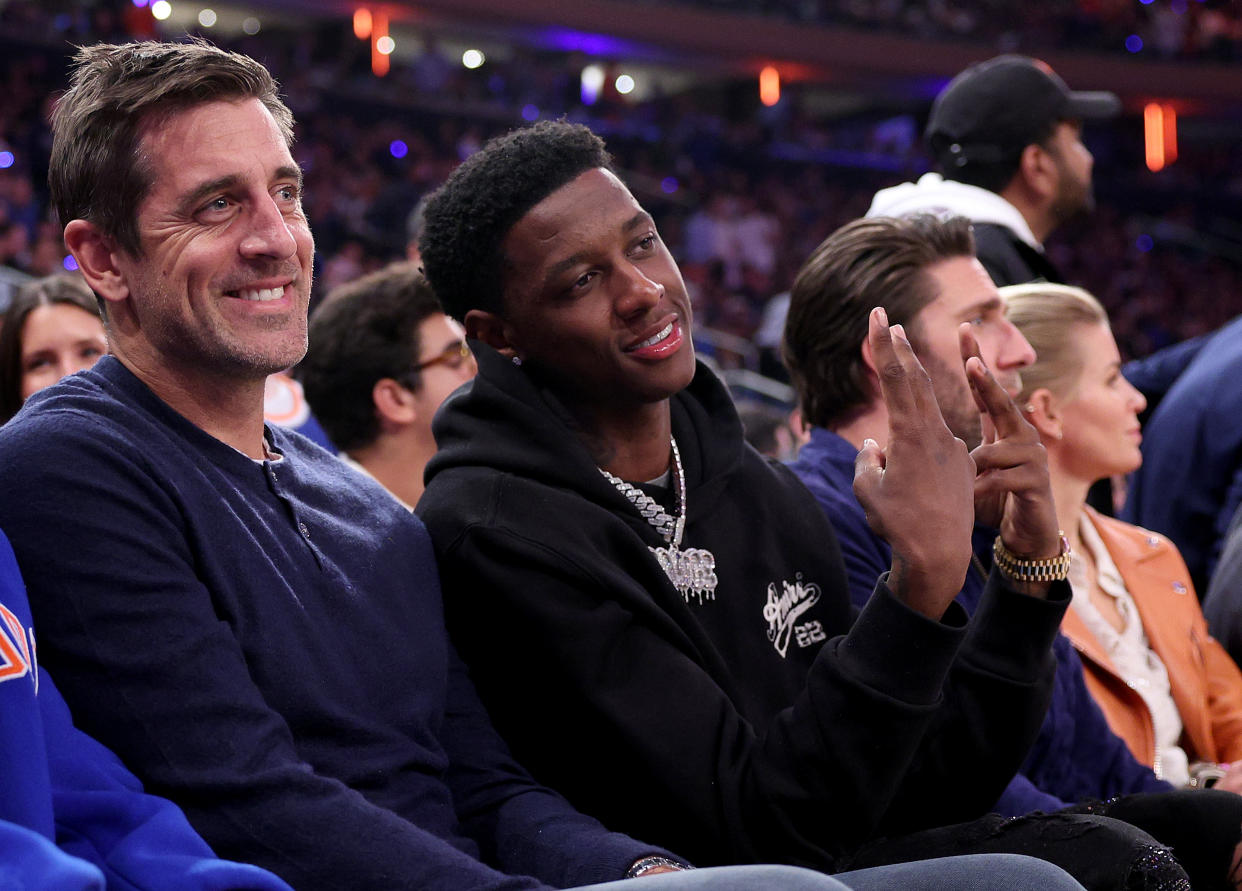 NEW YORK, NEW YORK - MAY 02:  New York Jets quarterback Aaron Rodgers and Jets cornerback Sauce Gardner attend game two of the Eastern Conference Semifinals between the New York Knicks and the Miami Heat at Madison Square Garden on May 02, 2023 in New York City. NOTE TO USER: User expressly acknowledges and agrees that, by downloading and or using this photograph, User is consenting to the terms and conditions of the Getty Images License Agreement. (Photo by Elsa/Getty Images)