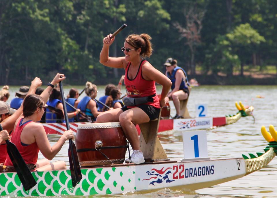 The 12 for 12 Dragon Boat Team gives it their all for their drummer, Tiffany Waugh, during the annual KARM Dragon Boat Festival held at the Cove at Concord Park on June 17, 2023.