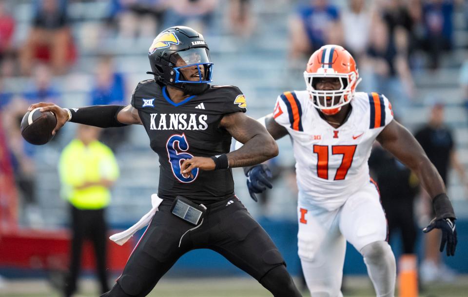 Kansas football quarterback Jalon Daniels throws a pass during a game against Illinois on Sept. 8, 2023 in Lawrence.