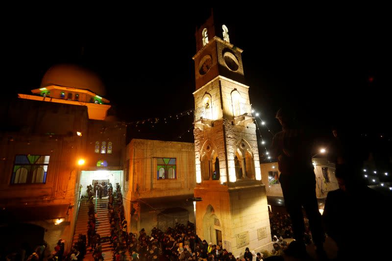 Palestinians perform the Fajr (Dawn) prayers outside Al-Nasir mosque in Nablus, in the Israeli-occupied West Bank