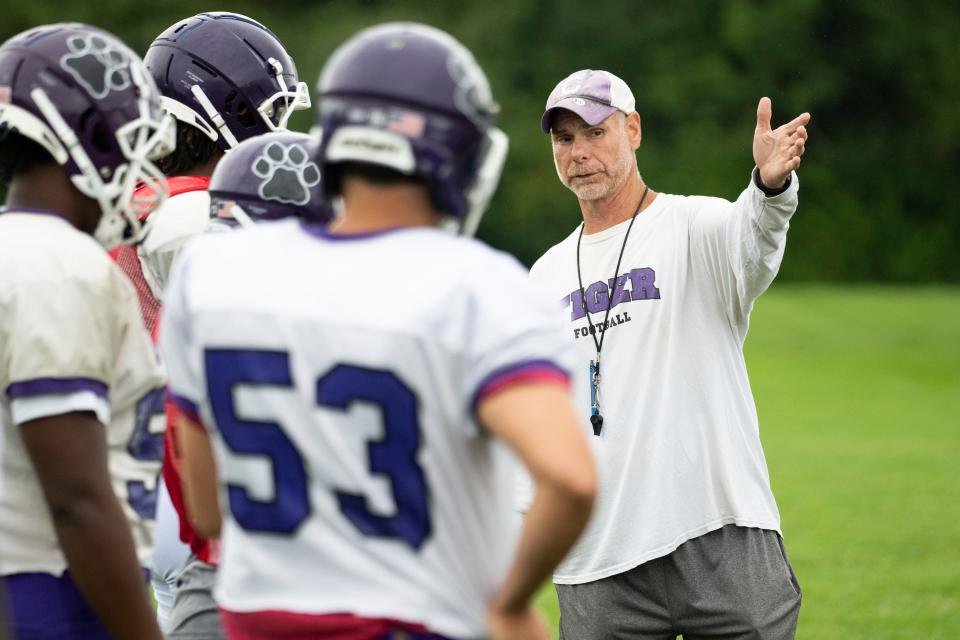 Pickerington Central coach Jeff Lomonico leads his team during practice last August.