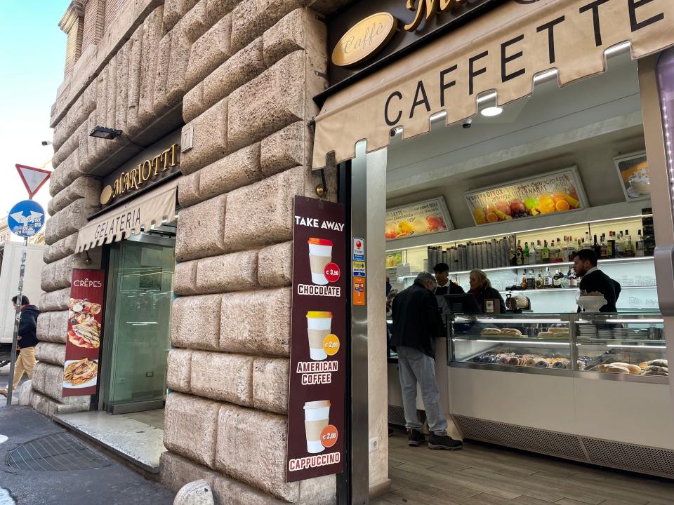 exterior shot of a small cafe in rome, italy