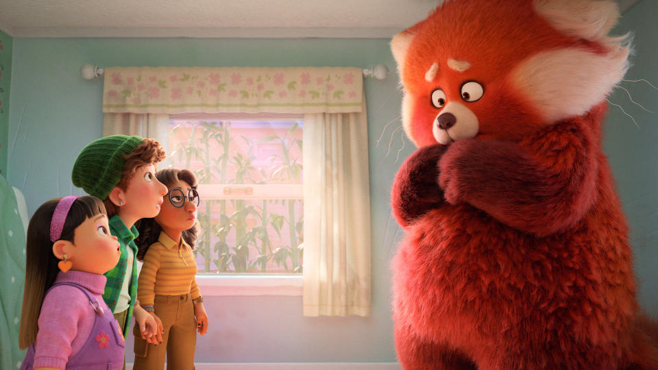 Domee Shi delved into her own childhood, and added an enormous red panda, for the story of 'Turning Red'. (Disney/Pixar)