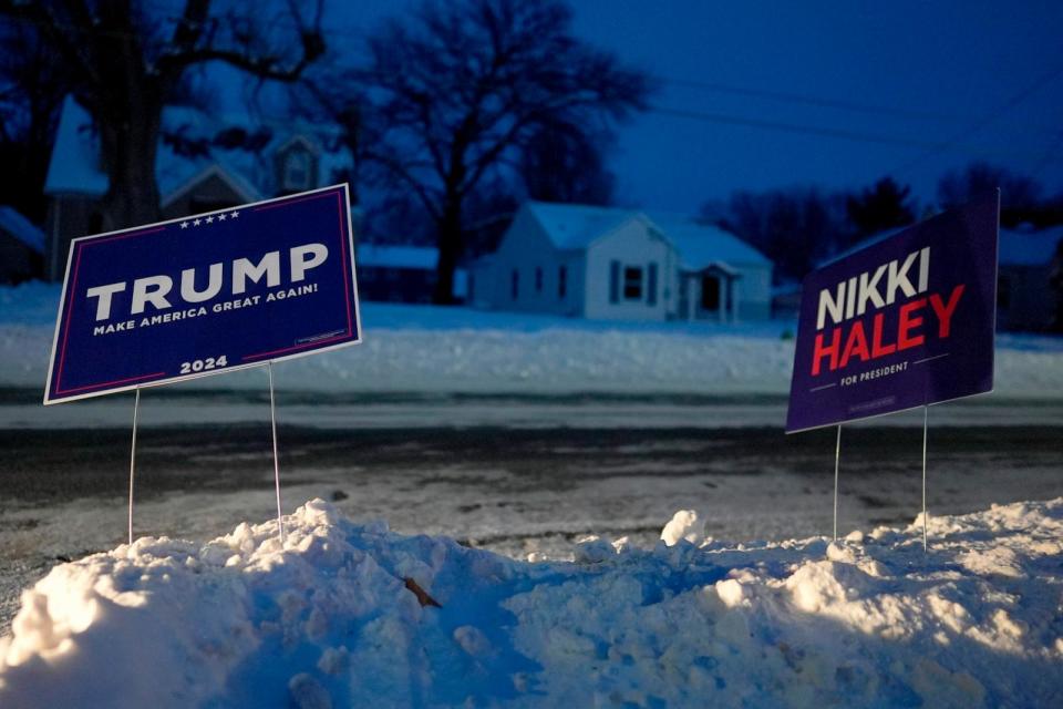 PHOTO: Campaign signs for Republican candidates Donald Trump and Nikki Haley appear outside Franklin Junior High in Des Moines, Iowa, Jan. 15, 2024. (Carolyn Kaster/AP)