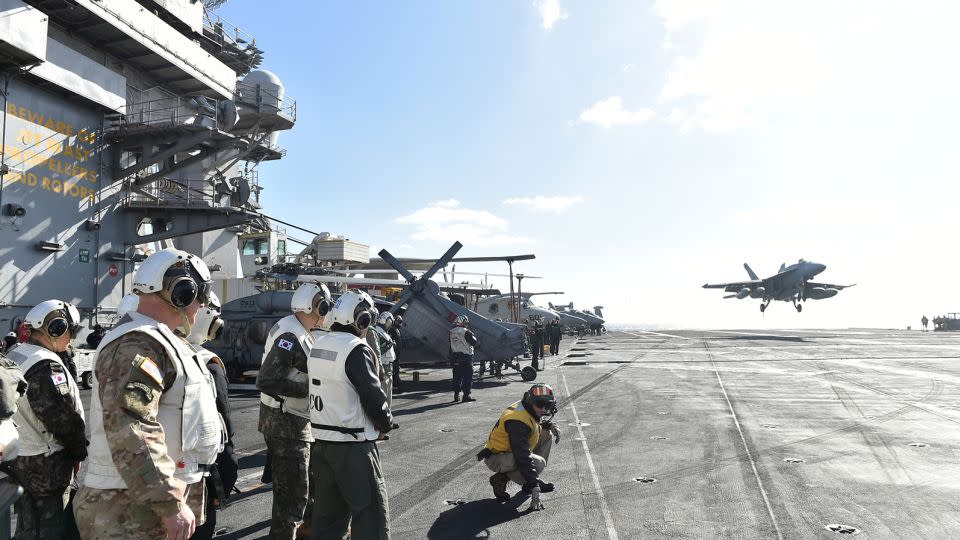 Chief of the South Korean Joint Chiefs of Staff Kim Myung-soo inspects aircraft on USS Carl Vinson on January 15, 2024. - South Korea's Defence Ministry