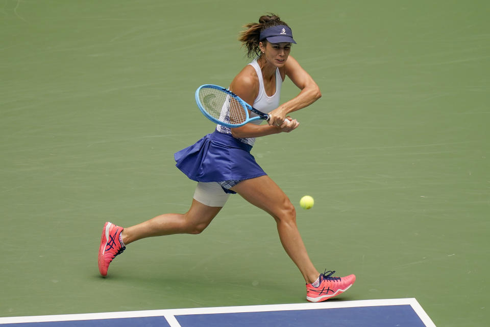 Tsvetana Pironkova, of Bulgaria, returns a shot to Serena Williams, of the United States, during the quarterfinals of the US Open tennis championships, Wednesday, Sept. 9, 2020, in New York. (AP Photo/Seth Wenig)