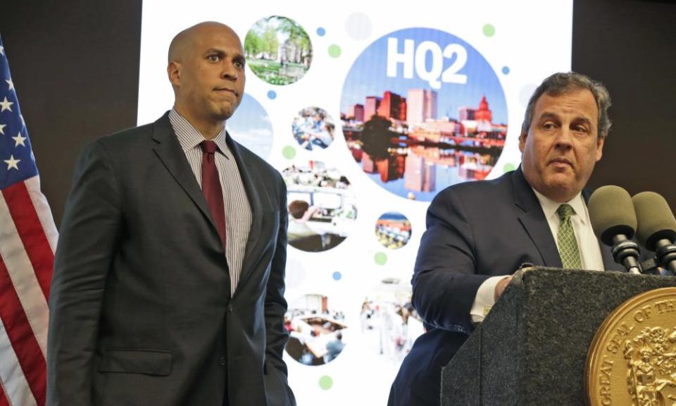 New Jersey governor with senator Cory Booker on Monday. New Jersey has pledged $7bn in tax credits to lure Amazon to Newark.