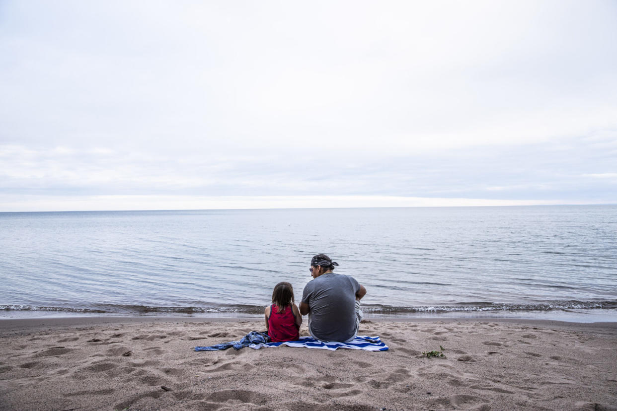  Man and his son at Waverly Beach on Lake Superior by Richard Schultz 2022. (Photo/Courtesy of 50 Eggs Films)