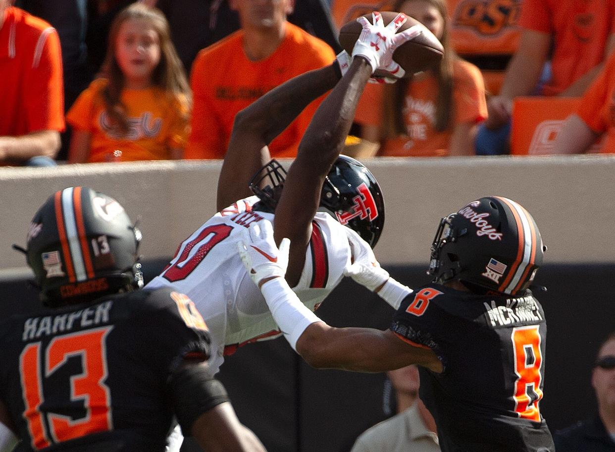 Texas Tech's wide receiver Trey Cleveland (10) catches the pass against Oklahoma State in a Big 12 football game, Saturday, Oct. 7, 2022, Boone Pickens Stadium in Stillwater, Okla. 