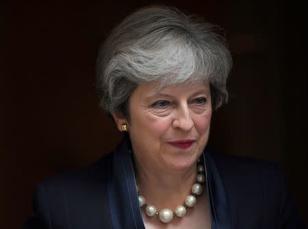 FILE PHOTO: Britain's Prime Minister Theresa May leaves 10 Downing Street in London, September 6, 2017. REUTERS/Toby Melville/File Photo