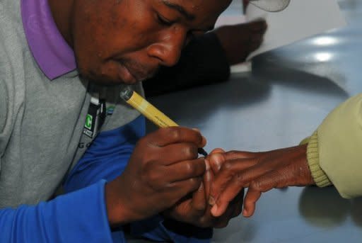 A Basotho voter is marked with indellible ink after voting at a polling station on the outskirts of Maseru. Lesotho counted ballots Saturday after a tight general election -- dominated by personal clashes rather than concerns over poverty -- that could produce the southern African nation's first coalition government