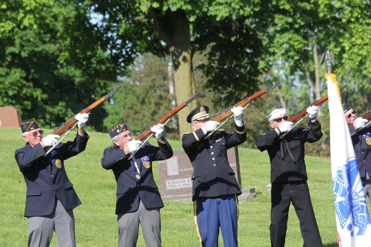 The Jonesville American Legion Post 195 Honor Guard fires a 21-gun salute during the 2019 Memorial Day Ceremony at Sunset View Cemetery.