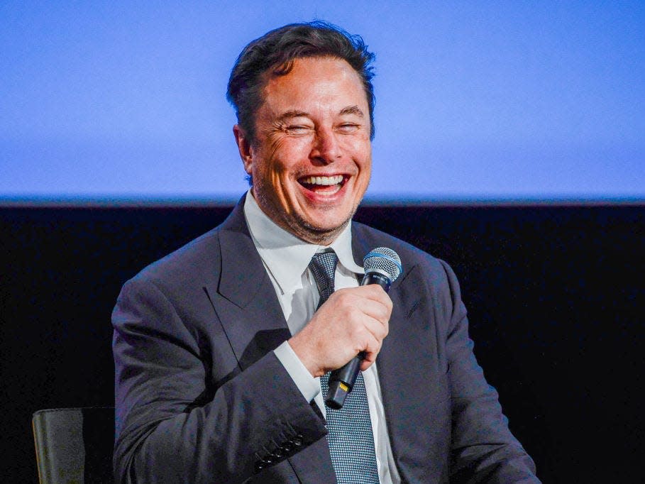 elon musk laugh microphone