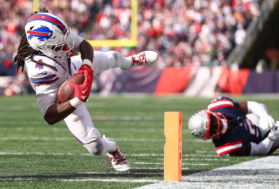 FOXBOROUGH, MASSACHUSETTS - OCTOBER 22: James Cook #4 of the Buffalo Bills scores a touchdown in the third quarter of the game against the New England Patriots at Gillette Stadium on October 22, 2023 in Foxborough, Massachusetts. (Photo by Maddie Meyer/Getty Images)