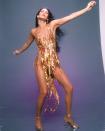 <p>Wearing another one of her famous Bob Mackie designs for a portrait session. </p>