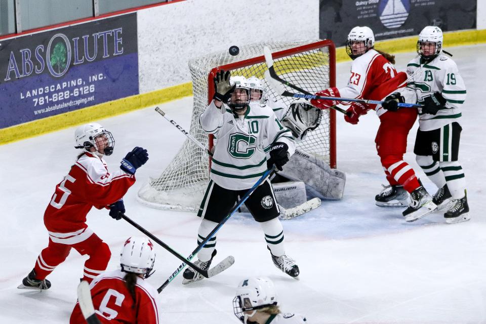 Canton's Tori Carr reaches for the puck during the Sweet 16 game against Milton in the Div. 2 state tournament at Canton Ice House on Saturday, March 4, 2023.