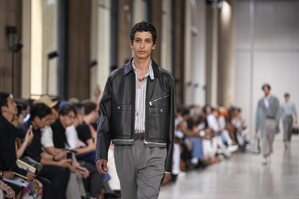 A model wears a creation for the Hermes Menswear Spring/Summer 2024 fashion collection presented in Paris, Saturday, June 24, 2023. (AP Photo/Michel Euler)