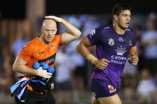 Jordan McLean is taken from the field for a concussion test. Pic: Getty