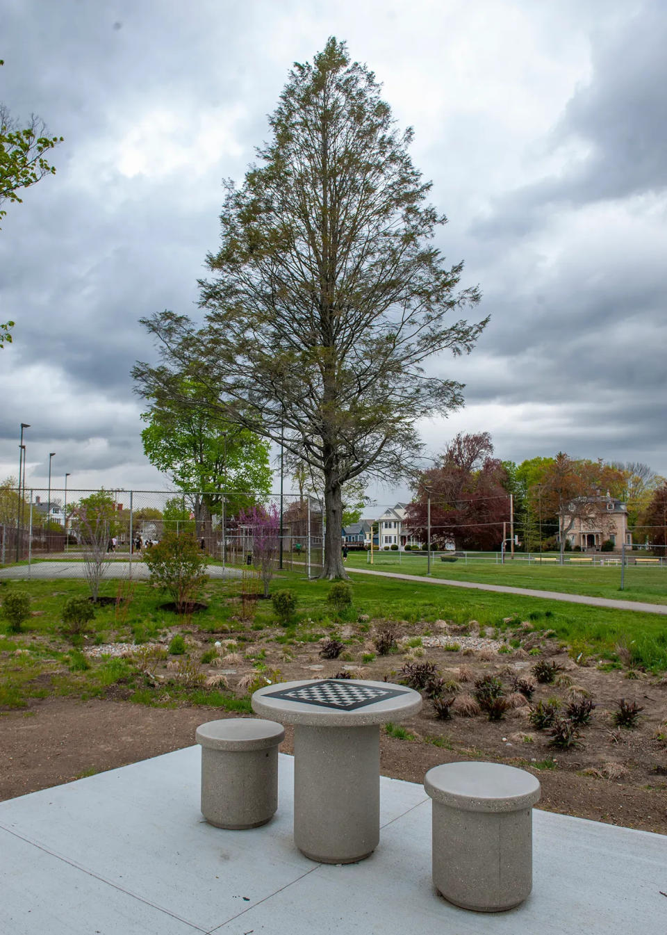 This concrete chess board is at the Milford Town Park. The town recently landed a $1.3 million federal grant that will be spent on Town Park improvements, including new walkways, fencing, lighting, basketball courts, ADA-compliant pathways, parking and a new outdoor fitness activity center.