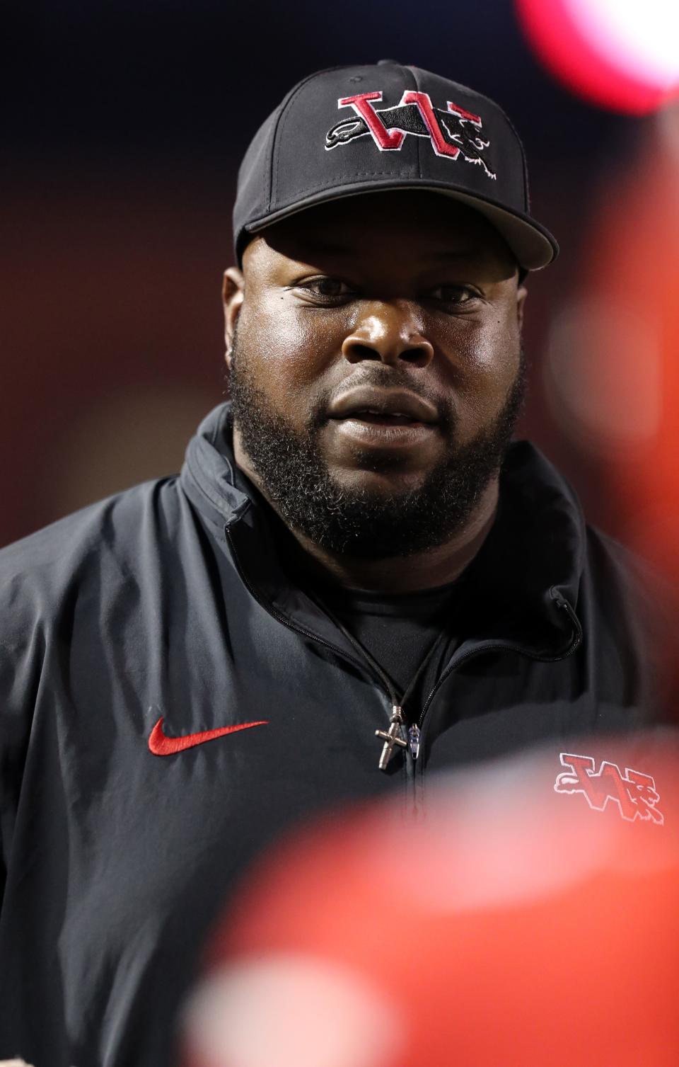 Westmoore head coach Lorenzo Williams talks with players as the Westmoore Jaguars play the Bixby Spartans in High School Football at Moore High School Stadium on Oct. 20, 2023 in Moore, Okla.