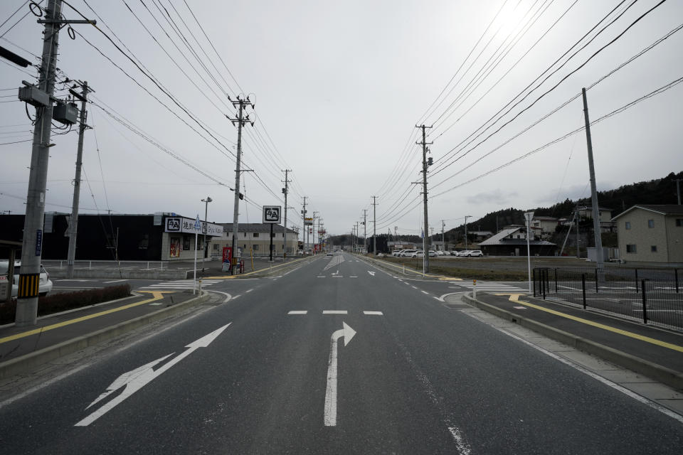 Nearly 10 years after the 2011 tsunami disaster, recovered streets are seen in Kesennuma, Miyagi Prefecture, northeastern Japan Friday, March 5, 2021. (AP Photo/Eugene Hoshiko)