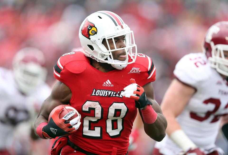 Jeremy Wright #28 of the Louisville Cardinals runs with the ball during the game against the Temple Owls at Papa John's Cardinal Stadium on November 3, 2012 in Louisville, Kentucky. (Photo by Andy Lyons/Getty Images)