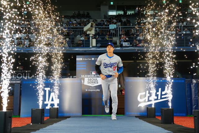 <p>Mary DeCicco/MLB Photos via Getty </p> Shohei Ohtani of the Los Angeles Dodgers takes the field prior to the 2024 Seoul Series game against the San Diego Padres on March 20.