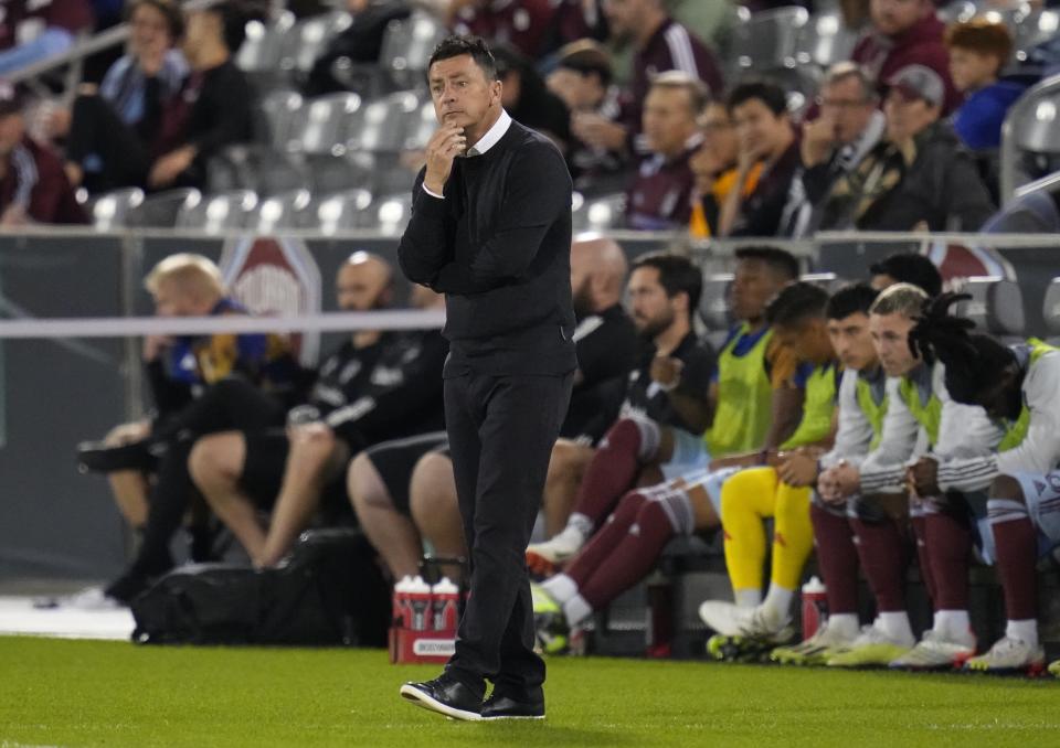 Colorado Rapids interim coach Chris Little watches the team play against the Vancouver Whitecaps during the first half of an MLS soccer match Wednesday, Sept. 27, 2023, in Commerce City, Colo. (AP Photo/Jack Dempsey)