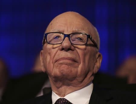 News Corp Chief Executive Rupert Murdoch is pictured in the audience before U.S. President Barack Obama delivered remarks at the Wall Street Journal CEO council annual meeting in Washington, November 19, 2013. REUTERS/Jason Reed