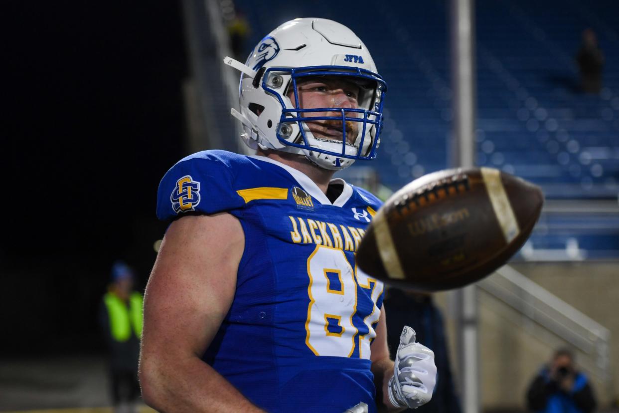 SDSU's tight end Zach Heins (87) throws the ball after a touchdown on Friday, Dec. 15, 2023 at Dana J. Dykhouse in Brookings.