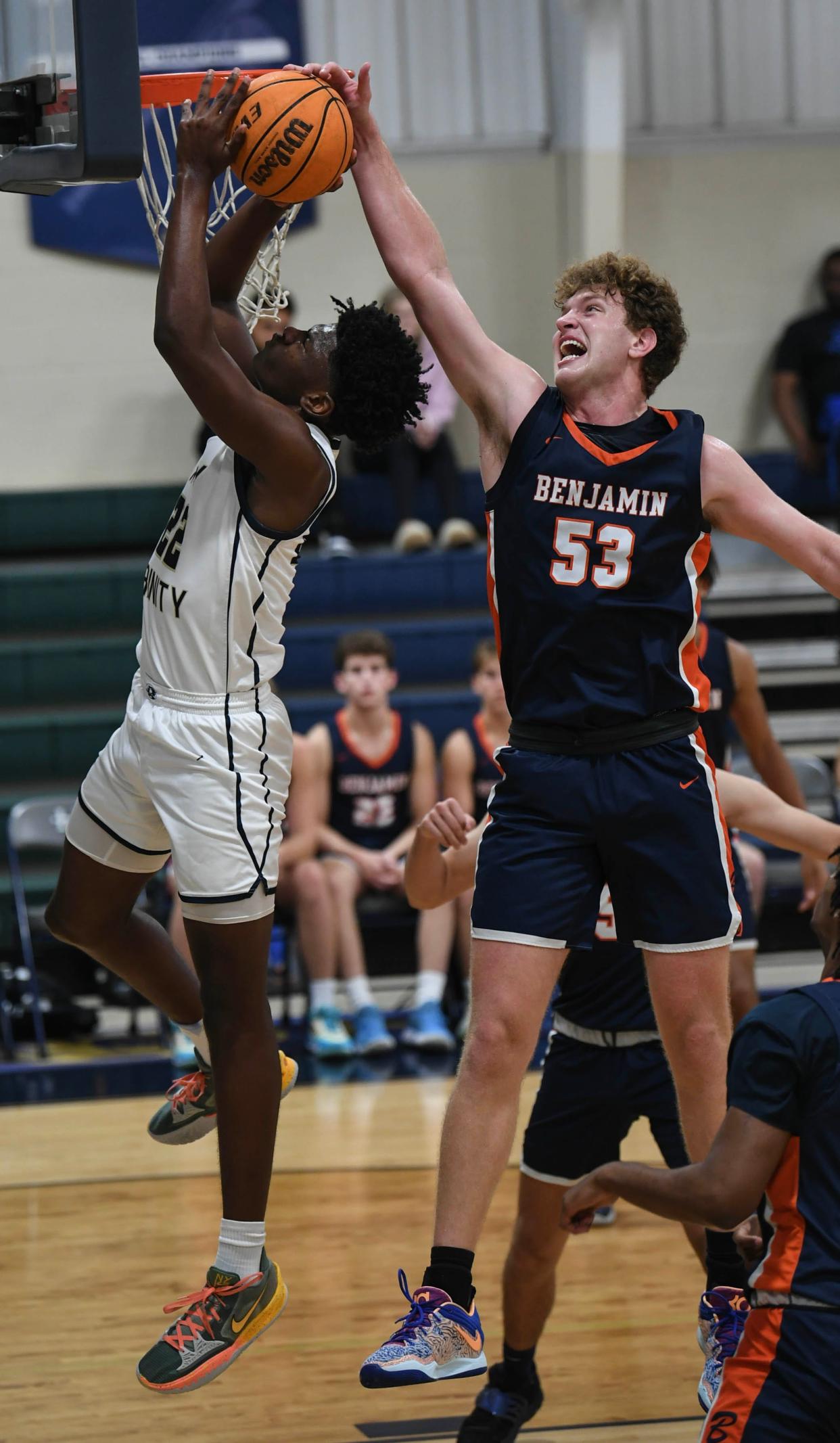 Willie Thompson of Holy Trinity has his shot blocked by Gavin Aydelotte during their game in the state Class 3A basketball tournament regional quarterfinals Thursday, February 16, 2023. Craig Bailey/FLORIDA TODAY via USA TODAY NETWORK