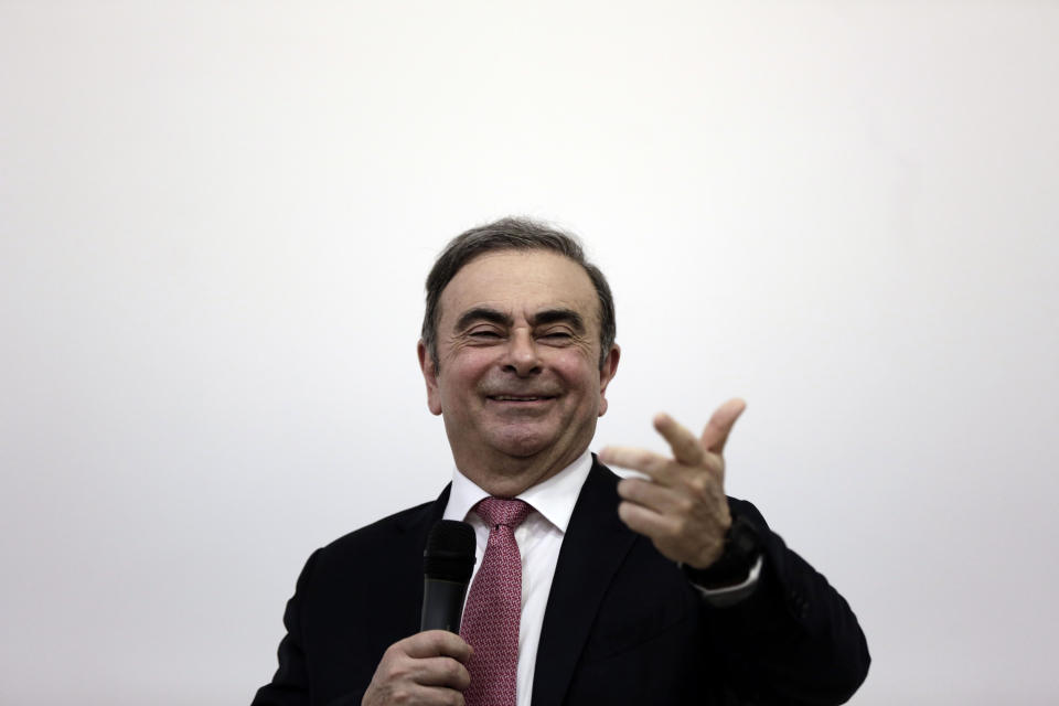 Nissan's former chairman Carlos Ghosn, smiles at a press conference in Beirut, Lebanon, Wednesday, Jan. 8, 2020. (AP Photo/Maya Alleruzzo)
