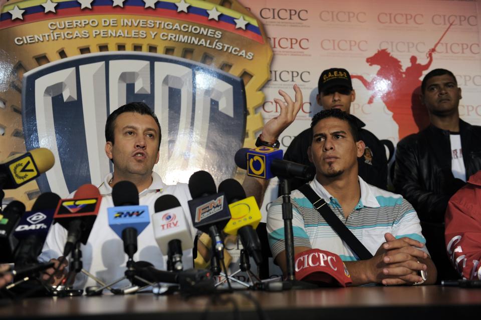 Venezuela's Interior and Justice Minister, Tareck El Aissami (L) speaks during a press conference next to Venezuelan Washington Nationals' baseball catcher, Wilson Ramos, in Valencia, Venezuela on November 12, 2011. Ramos, whose kidnapping in his native Venezuela has anguished sports fans around the world, has been rescued alive, government officials said. AFP PHOTO/Leo RAMIREZ (Photo credit should read LEO RAMIREZ/AFP/Getty Images)
