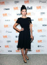 BEST: French actress Audrey Tautou is adorable in this little black dress with button detailing going down the side. We also approve of the chignon on top of her head and the gold-detailed shoes.