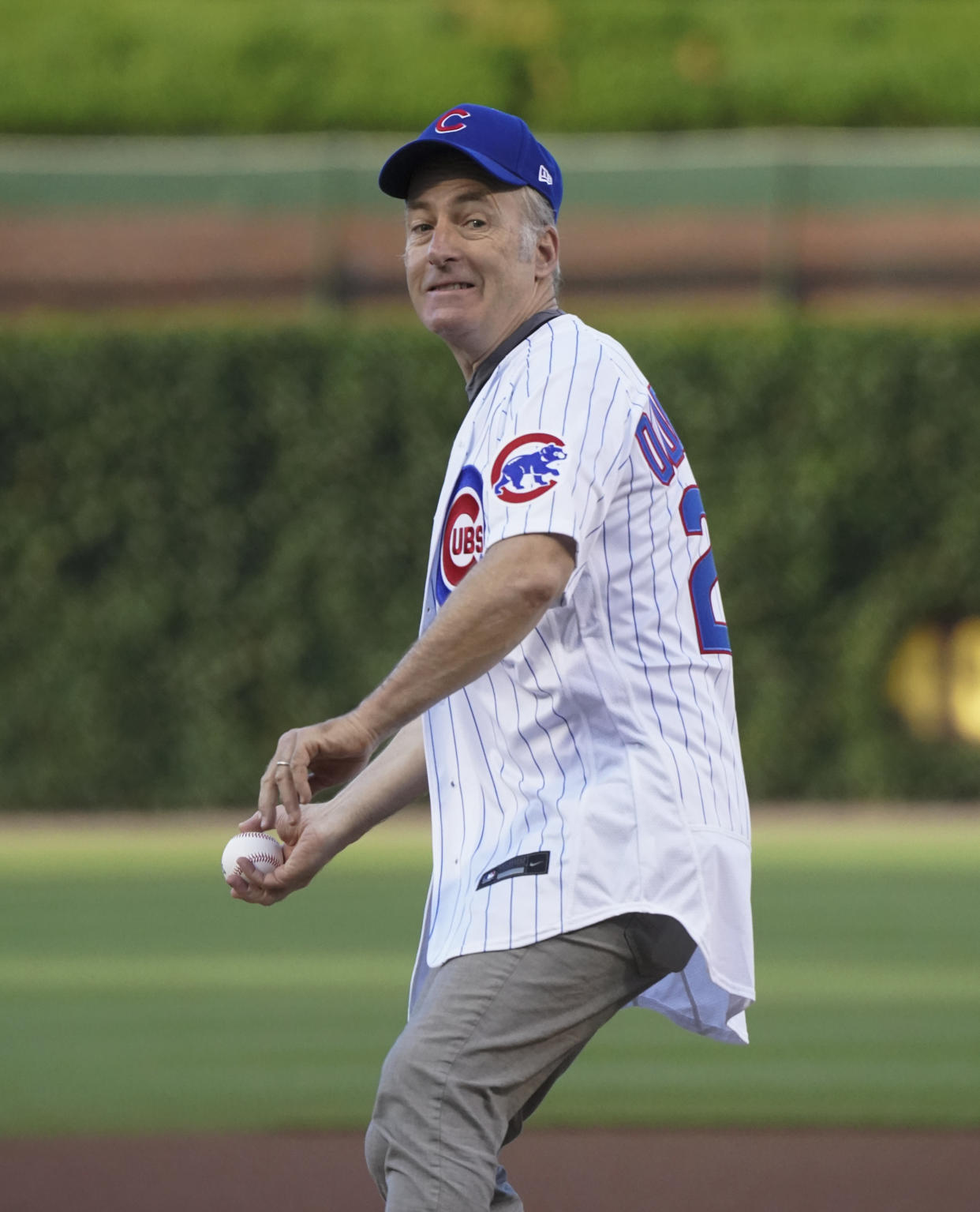 CHICAGO, ILLINOIS - JULY 25: Actor Bob Odenkirk  throws the ceremonial first pitch of the game between the Chicago Cubs and the Pittsburgh Pirates at Wrigley Field on July 25, 2022 in Chicago, Illinois. (Photo by Nuccio DiNuzzo/Getty Images)