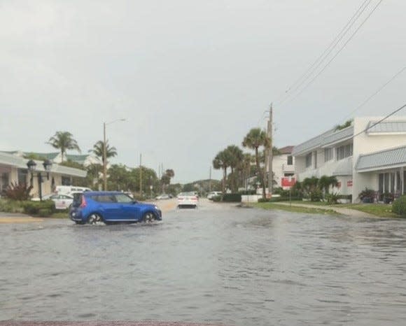 Ocean Drive near the entrance to Humiston Beach Park in Vero Beach accumulated standing water after about an hour of rain the afternoon of May 15, 2024.