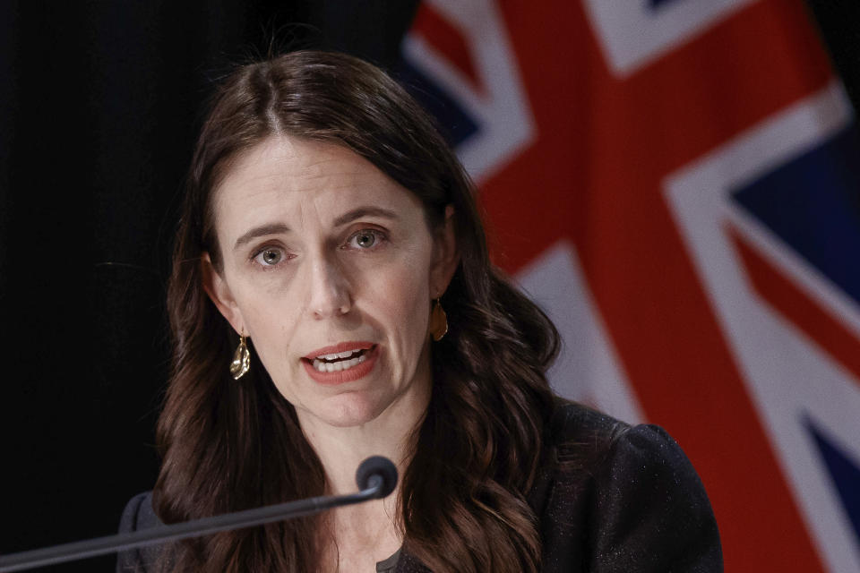 FILE - In this Oct. 11, 2021, file photo, New Zealand Prime Minister Jacinda Ardern answers a question during a press conference at Parliament in Wellington, New Zealand. New Zealand health care workers administered a record number of vaccine jabs Saturday, Oct. 16, 2021 as the nation held a festival aimed at getting more people inoculated against the coronavirus. (Robert Kitchin/Pool Photo via AP)