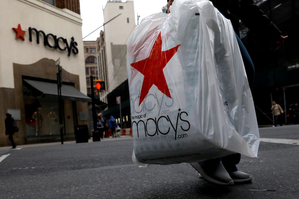 A customer exits after shopping at a Macy’s store in the Brooklyn borough of New York, U.S., May 11, 2017. REUTERS/Brendan McDermid