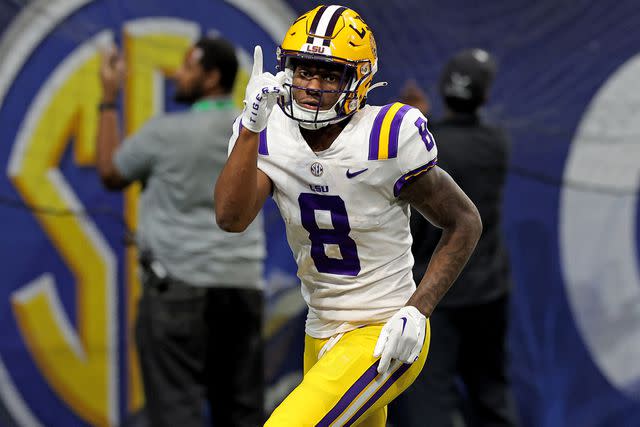 Kevin C. Cox/Getty Malik Nabers of the LSU Tigers celebrates after scoring a 34 yard touchdown during a game in December 2022.