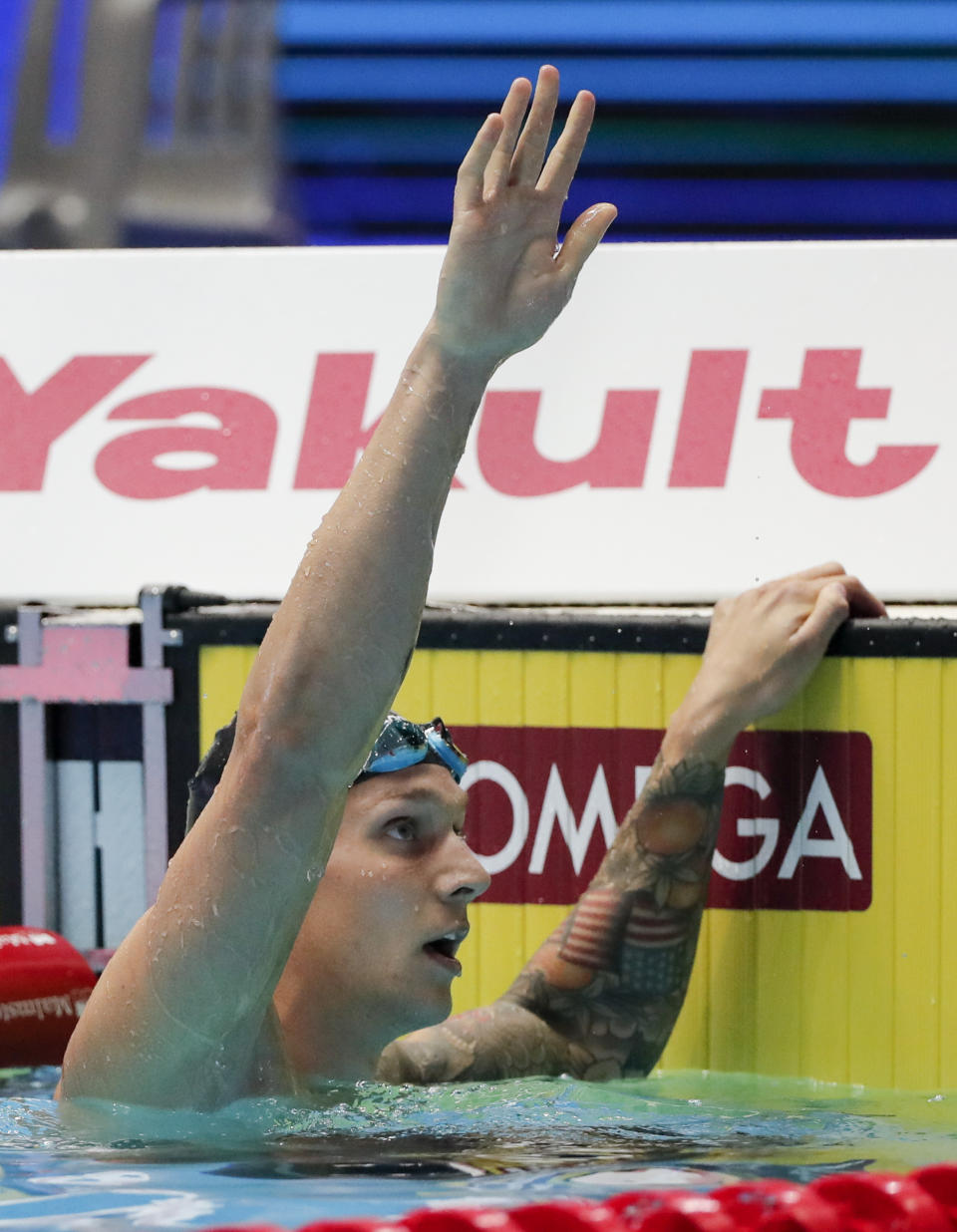 United States' Caeleb Dressel waves after winning the men's 50m butterfly final at the World Swimming Championships in Gwangju, South Korea, Monday, July 22, 2019. (AP Photo/Lee Jin-man)
