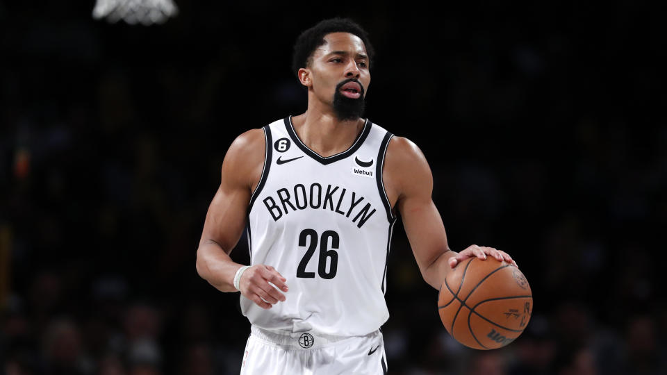 Brooklyn Nets guard Spencer Dinwiddie (26) dribbles the ball against the Cleveland Cavaliers during the second half of an NBA basketball game, Thursday, March 23, 2023, in New York. The Cleveland Cavaliers won 115 - 109. (AP Photo/Noah K. Murray)