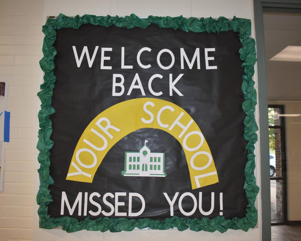 A sign hanging in the main hallway at Sand Creek Jr./Sr. High School Aug. 21 welcomes students back to the classroom for the start of the 2023-24 school year.