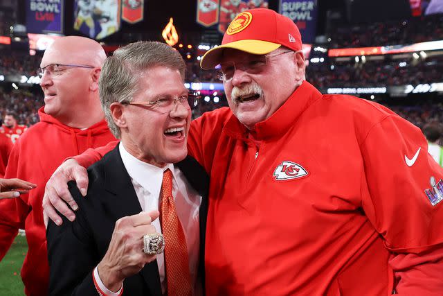 <p>Perry Knotts/Getty</p> Clark Hunt (left) and Chiefs head coach Andy Reid celebrate at the Super Bowl on Feb. 11, 2024