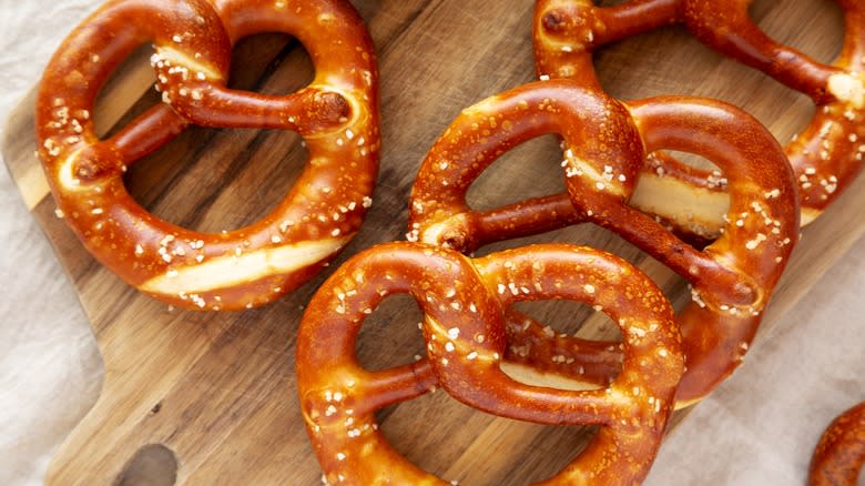 Soft pretzels on cutting board