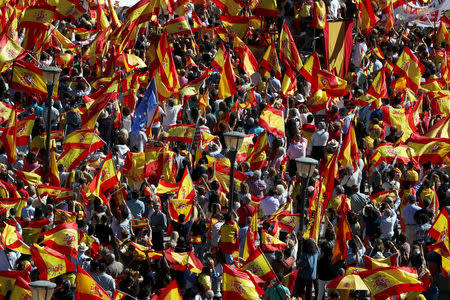 People take part in a pro-union demonstration in Madrid, Spain, October 7, 2017. REUTERS/Sergio Perez