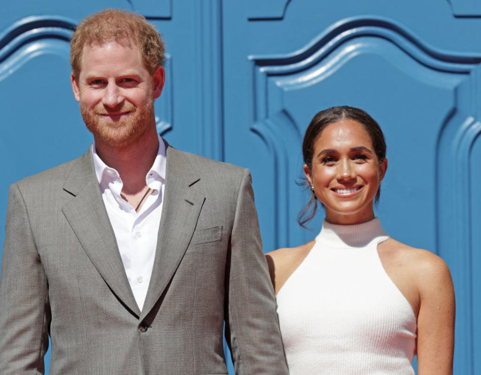 Harry and Meghan smiling