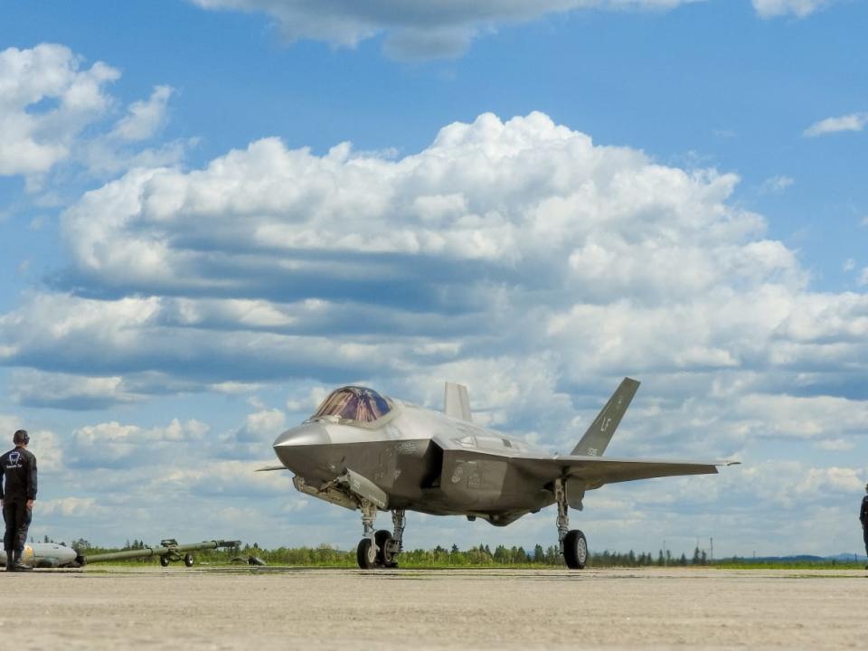 Members of the U.S. Air Force F-35A Lightning II Demonstration Team prepare to launch Captain Andrew 