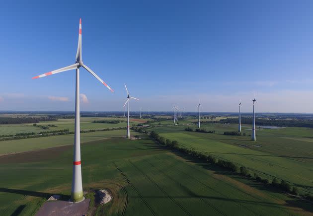 BRUECK, GERMANY - JUNE 08:  In this aerial view wind turbines spin on June 8, 2016 near Brueck, Germany. Germany is investing heavily in renewable energy sources, including wind farms and solar fields, in an effort to cut climate warming emissions and replace nuclear power.  (Photo by Sean Gallup/Getty Images) (Photo: Sean Gallup via Getty Images)