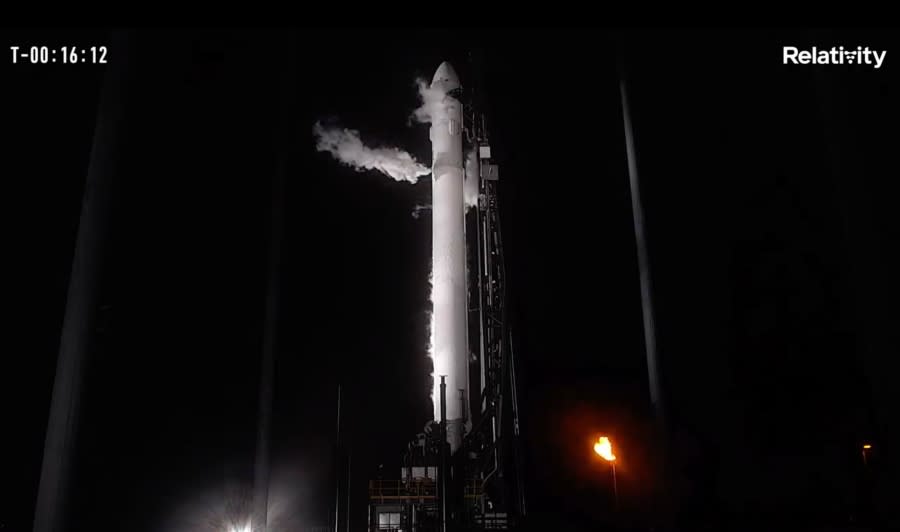 In this frame grab from livestreamed video provided by Relativity Space, Terran 1 sits on a launch pad at Cape Canaveral, Fla., late Wednesday, March 22, 2023. The rocket is made almost entirely of 3D-printed parts. (Relativity Space via AP)