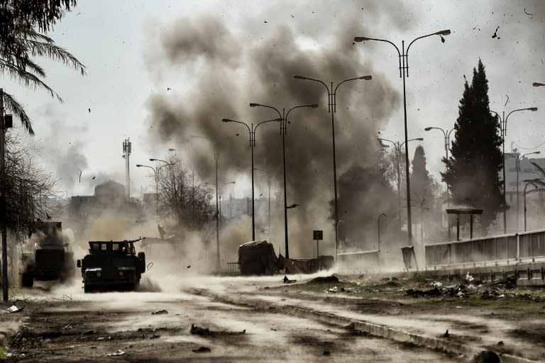 Smoke billows following a car bomb explosion as Iraqi forces clash with Islamic State (IS) group fighters in Mosul, northern Iraq on March 5, 2017, during an offensive to retake the western parts of the city from the jihadists